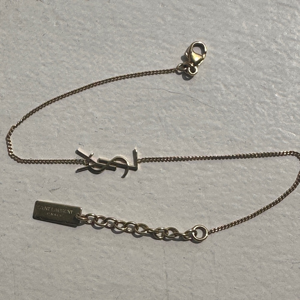 YSL OPYUM CHARM BRACELET in Gold Brass